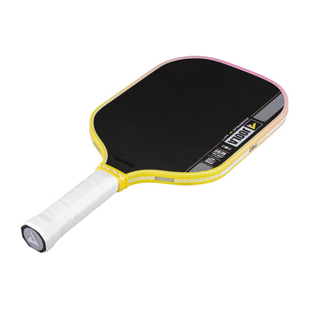 Pickleball paddle with black playing surface, yellow frame, and white handle on a white background.