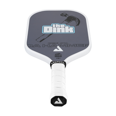 A pickleball paddle with a white frame and handle, featuring a dark gray face with 'The Dink' and 'DA HAMMER' branding, shown against a plain white background.
