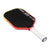 Pickleball paddle with black surface, red frame, and white handle on a white background