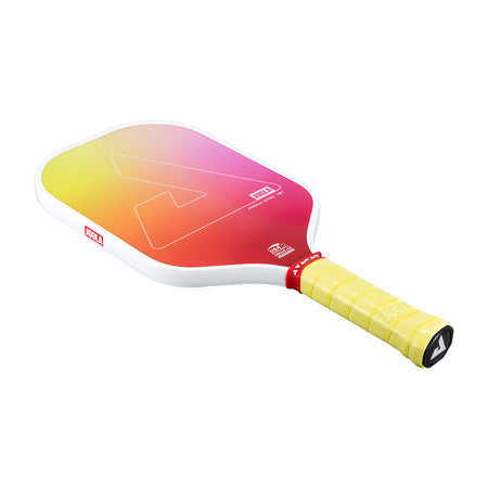 White background, product photo of the JOOLA Perseus Astral pickleball paddle with a yellow handle and white edge guard, and sunset gradient colored paddle face.
