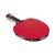 Red JOOLA table tennis racket with black handle on a white background.