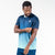 White background, product image showing a Man posing in a light blue and navy blue JOOLA Men's Table Tennis competition shirt.