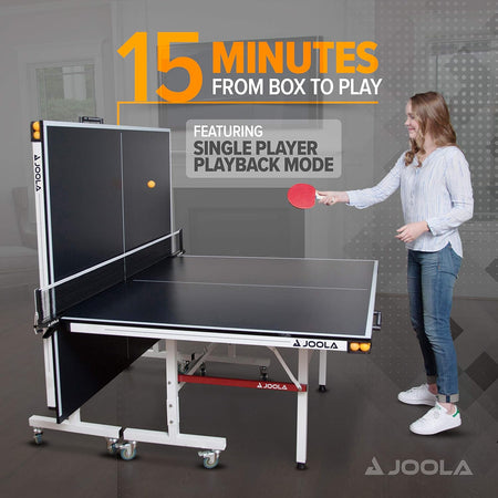 Infographic showing a female model hitting a ball off the upside of a folded table tennis table. The infographic indicates that it will be 15 minutes from box to play.