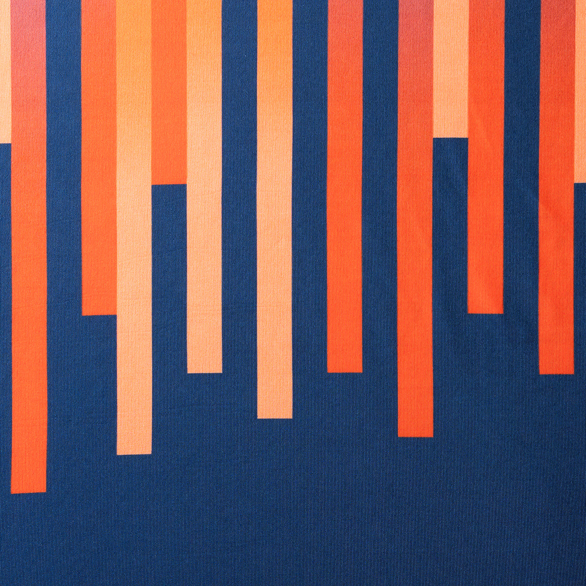 Pattern of vertical orange and beige stripes on a blue background.