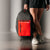 Close up image on the Agassi Vision II backpack in Brooke Buckner's hand.