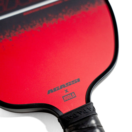 White background, close up product image of the Agassi x JOOLA Agassi Champion pickleball paddle's surface.