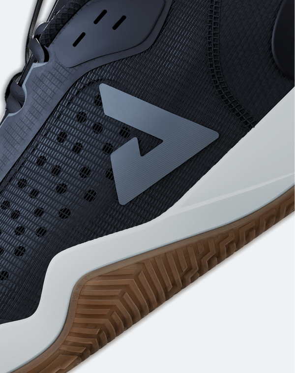 Close up on the JOOLA Men's R4LLy pickleball shoe, black with a gum sole.