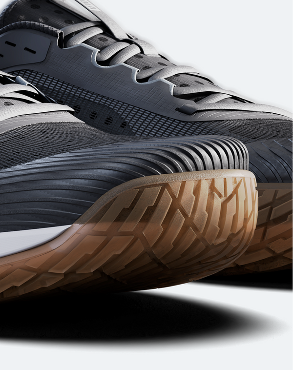 Close-up on the front of a pair of JOOLA Men's R4LLy pickleball shoes, black.