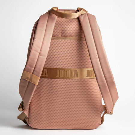 Gray background, product image of the JOOLA Back Pack, latte colored.