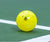 Close up image of a JOOLA Primo Pickleball on a pickleball court.