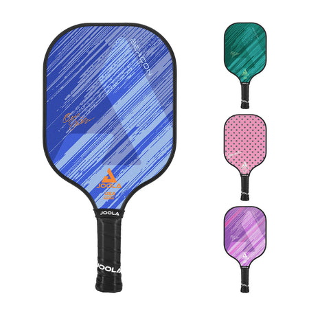 White background, angled product image of the JOOLA Beacon Pickleball Paddle with a black handle and blue JOOLA graphic on the paddle's face. Also pictured are smaller images of the paddle in the alternative colors of green, purple and pink polkadots.