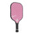 White background, product image of a JOOLA Simone Jardim Beacon pickleball paddle. The paddle has a black handle and the paddle surface is pink with polkadots.