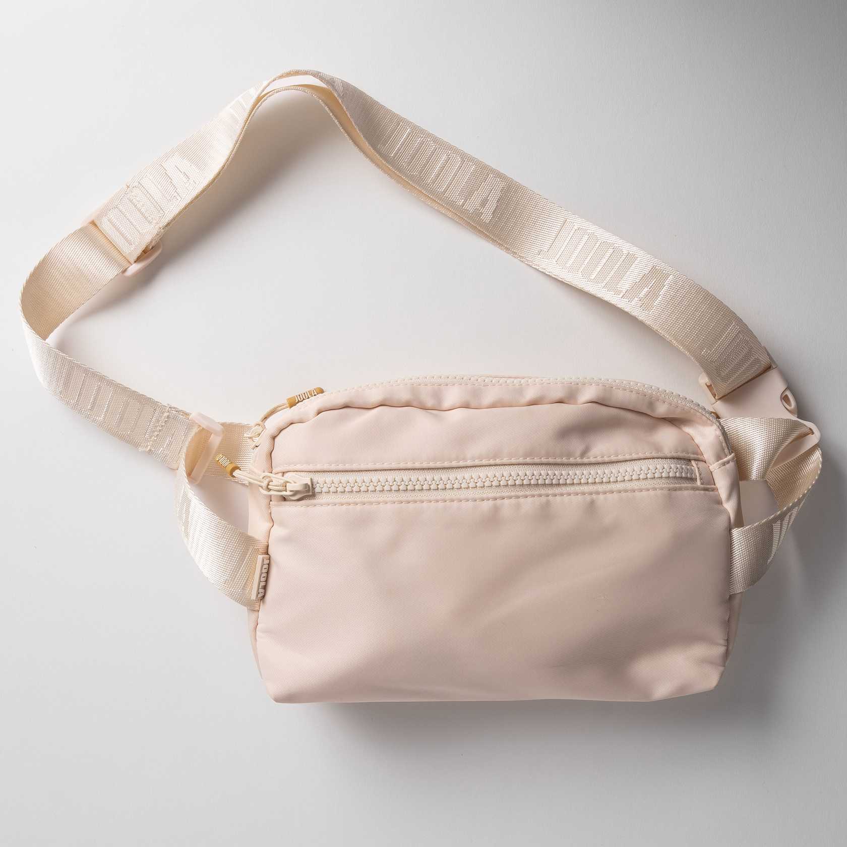 Gray background, image of a JOOLA Belt Bag, sandstone.
