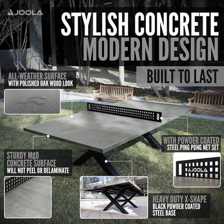 A JOOLA ping pong table with concrete surface and wooden bench in outdoor setting.