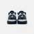 White background, product image showing the back heel view of the JOOLA Men's R4LLy pickleball shoe, navy blue and white.