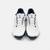 White background, aerial view of the JOOLA Men's R4LLy pickleball shoe, white and navy blue colorway.