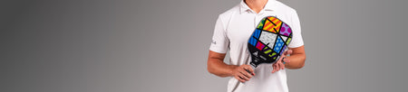 Header image of Ben Johns' torso and hands holding a JOOLA x Britto Signature Pickleball Paddle.