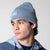 Image of a male model wearing a blue JOOLA Cuff Beanie.