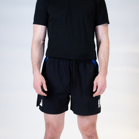 White background, product image of the JOOLA Hugo Calderano shorts, black and blue with a 5-inch inseam.