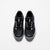 White background, aerial view of a pair of Black JOOLA R4LLy pickleball shoes.