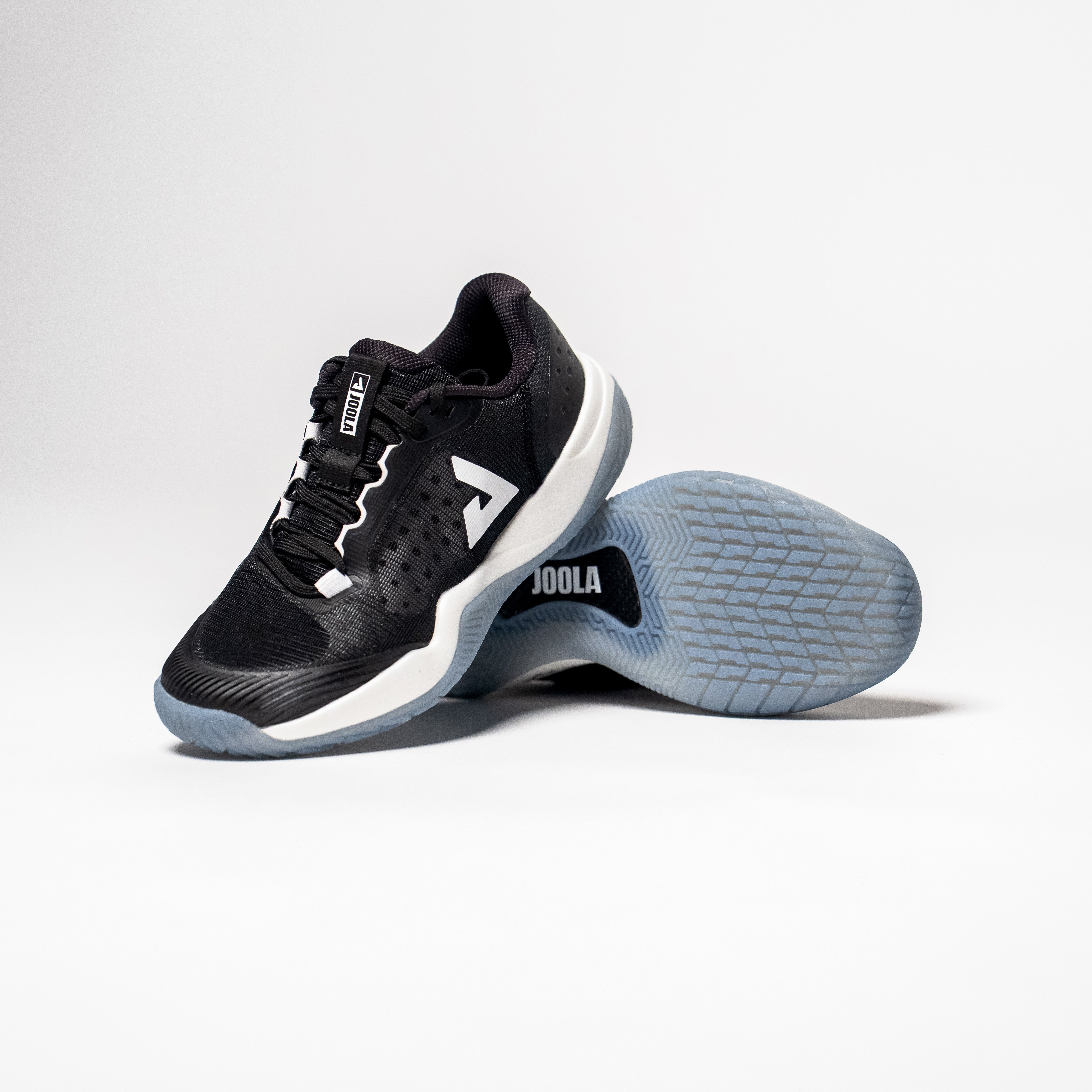 Stylized image of a pair of JOOLA R4LLy pickleball shoes, black colorway.
