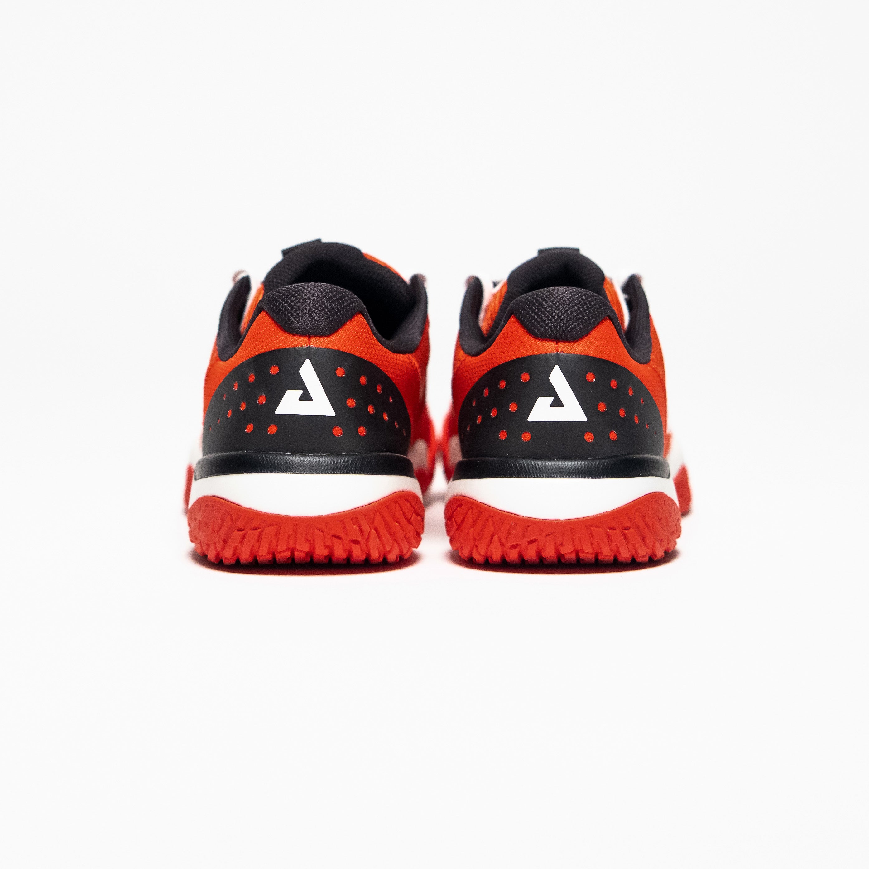 White background, image showing the Trinity logo on the back of a pair of JOOLA Red R4LLy pickleball shoes.