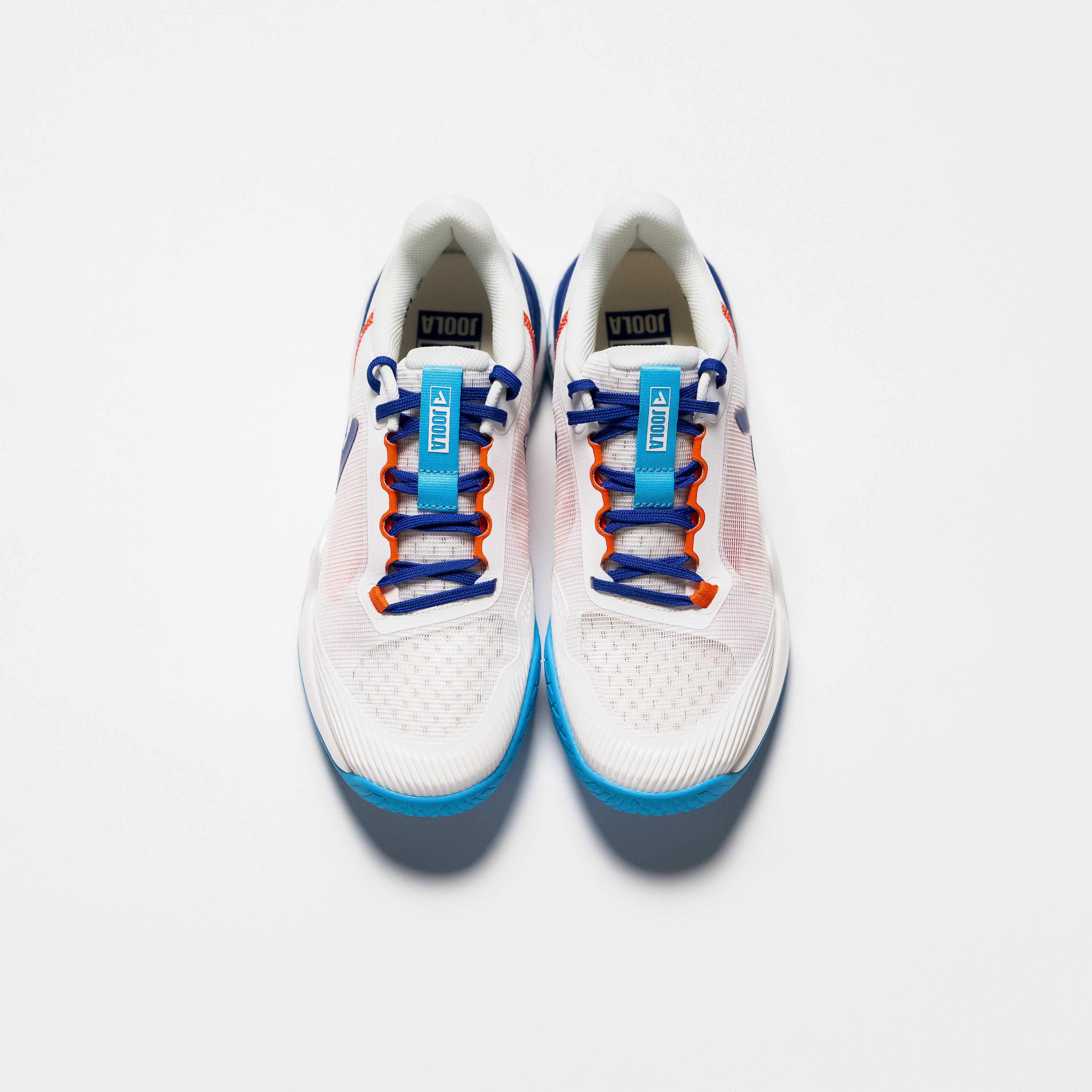 White background, top down view of the JOOLA R4LLy pickleball shoe, white and blue colorway.