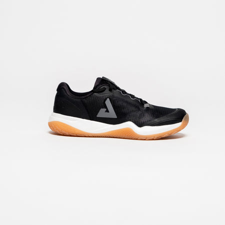 White background, side view of a JOOLA Men's R4LLy pickleball shoe, black with a gum sole.