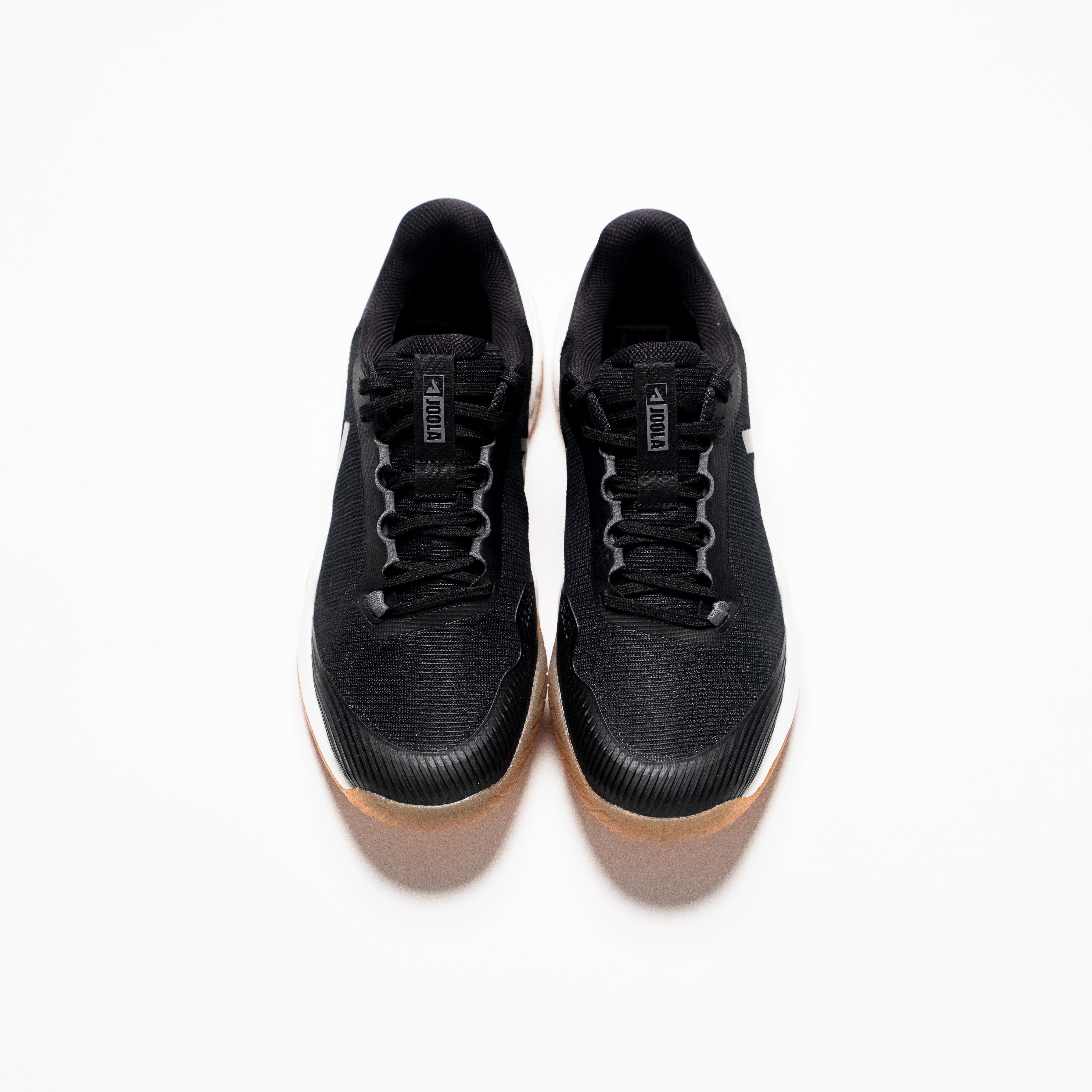 White background, product image of a pair of Men's R4LLy pickleball shoes, black, with gum sole.