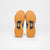 White background photo image of a pair of JOOLA R4LLy Men's Black shoes with gun sole.