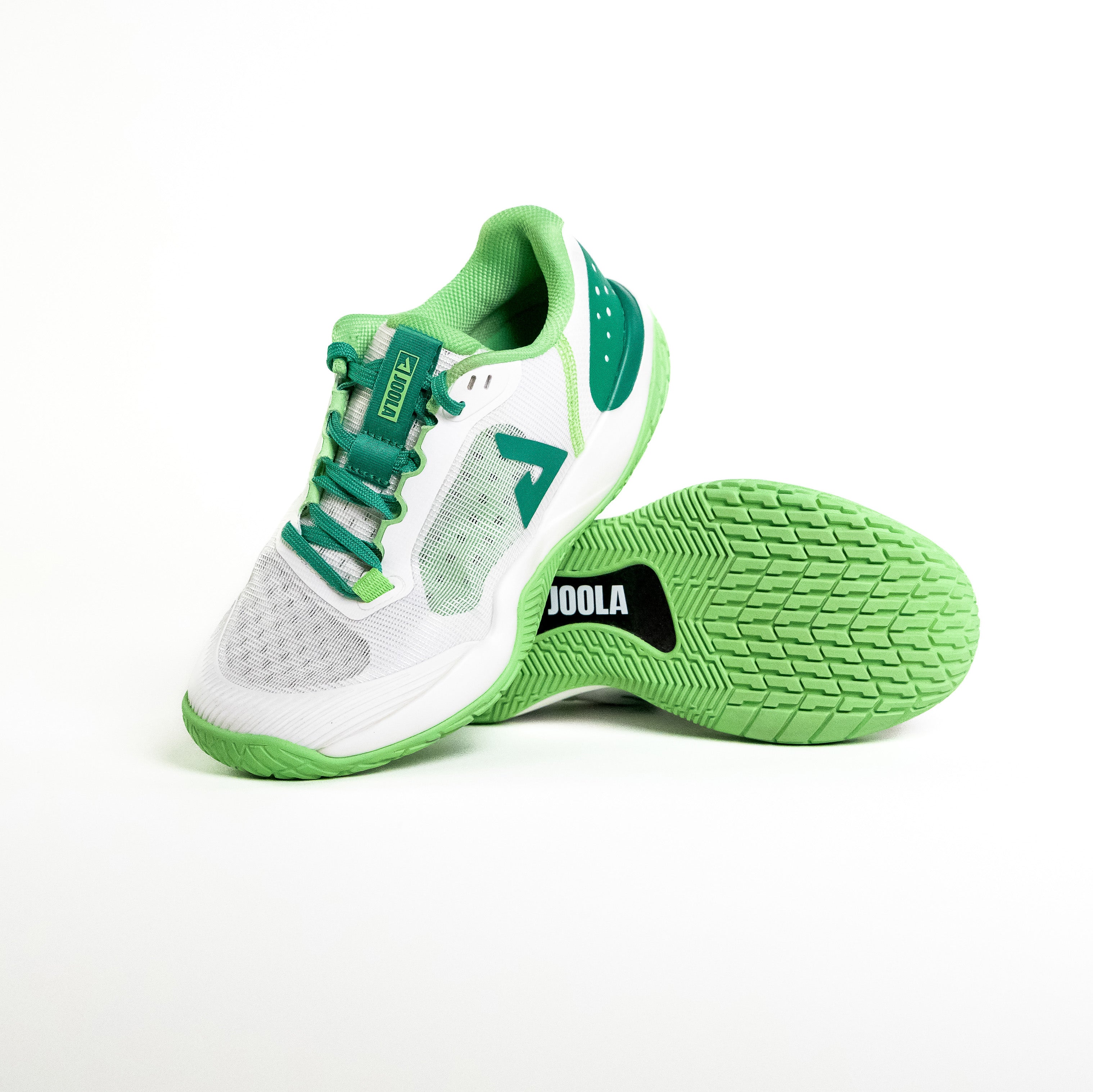 White background, stylized image of a pair of JOOLA R4LLy pickleball shoes, green and white colorway.