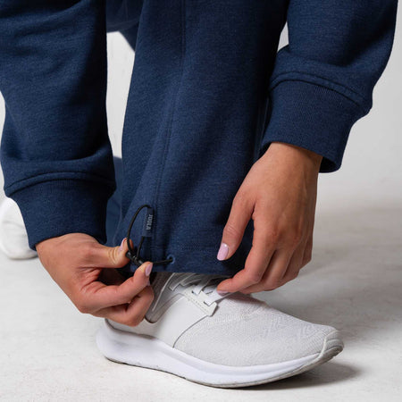 Close up on the bottom pant cuff of the JOOLA Fleece Pants, Navy.