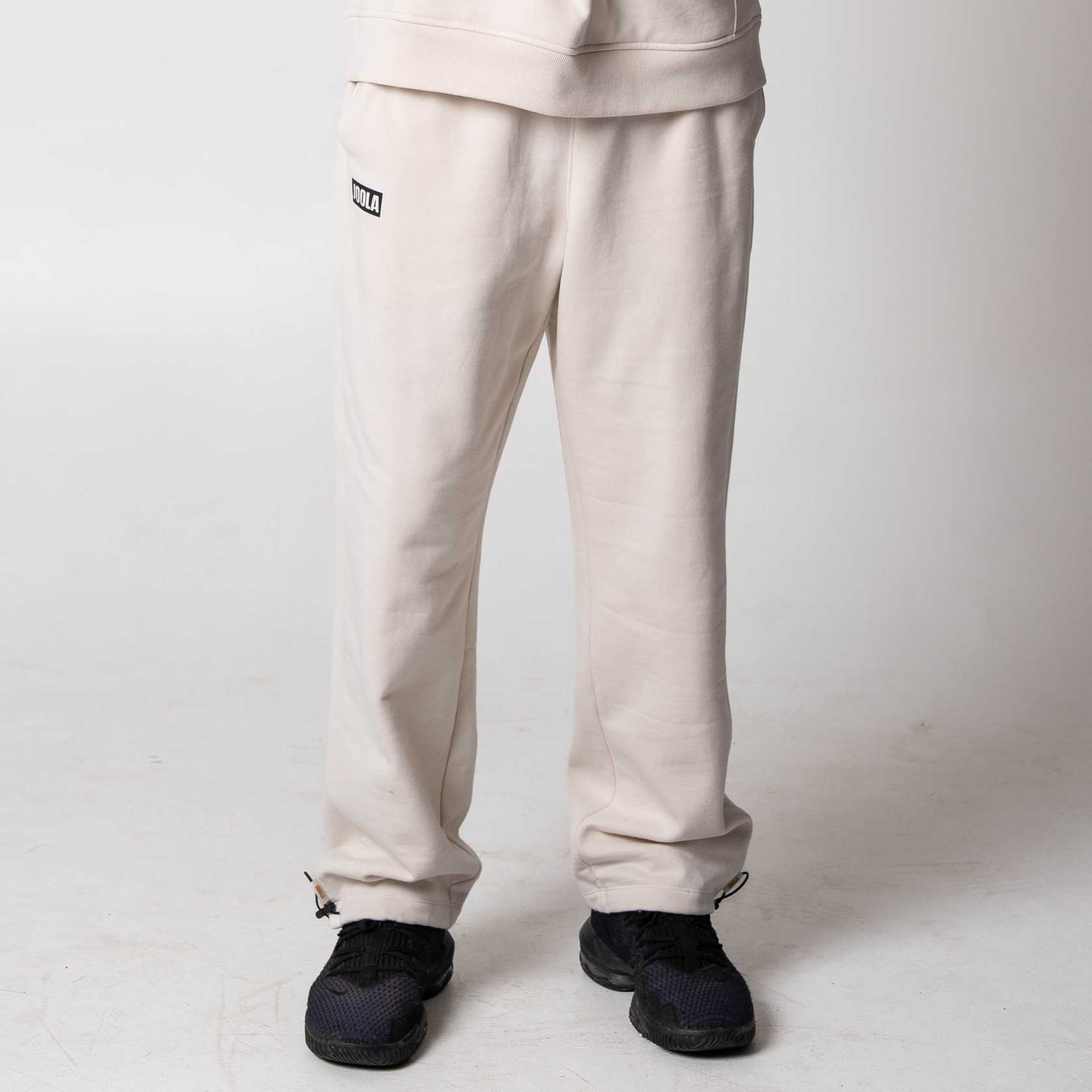 Gray background, image of a pair of JOOLA Fleece Pants.