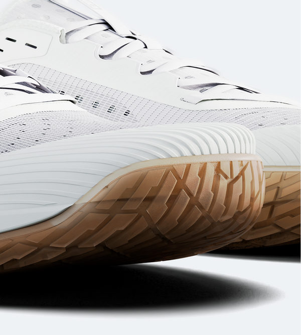 Close-up of a pair of JOOLA R4LLy men's pickleball shoe with brown sole on a light gray background