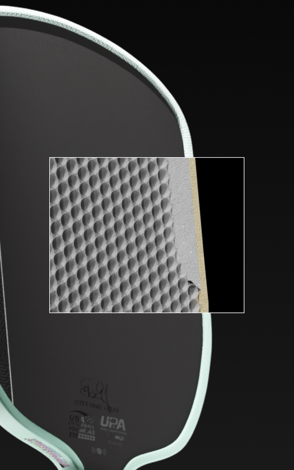 Close up on the detailed honeycomb core inside a JOOLA Graf Pro V.