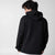 Gray background, image of showing the back of a male model wearing a black JOOLA Graphic Hoodie.
