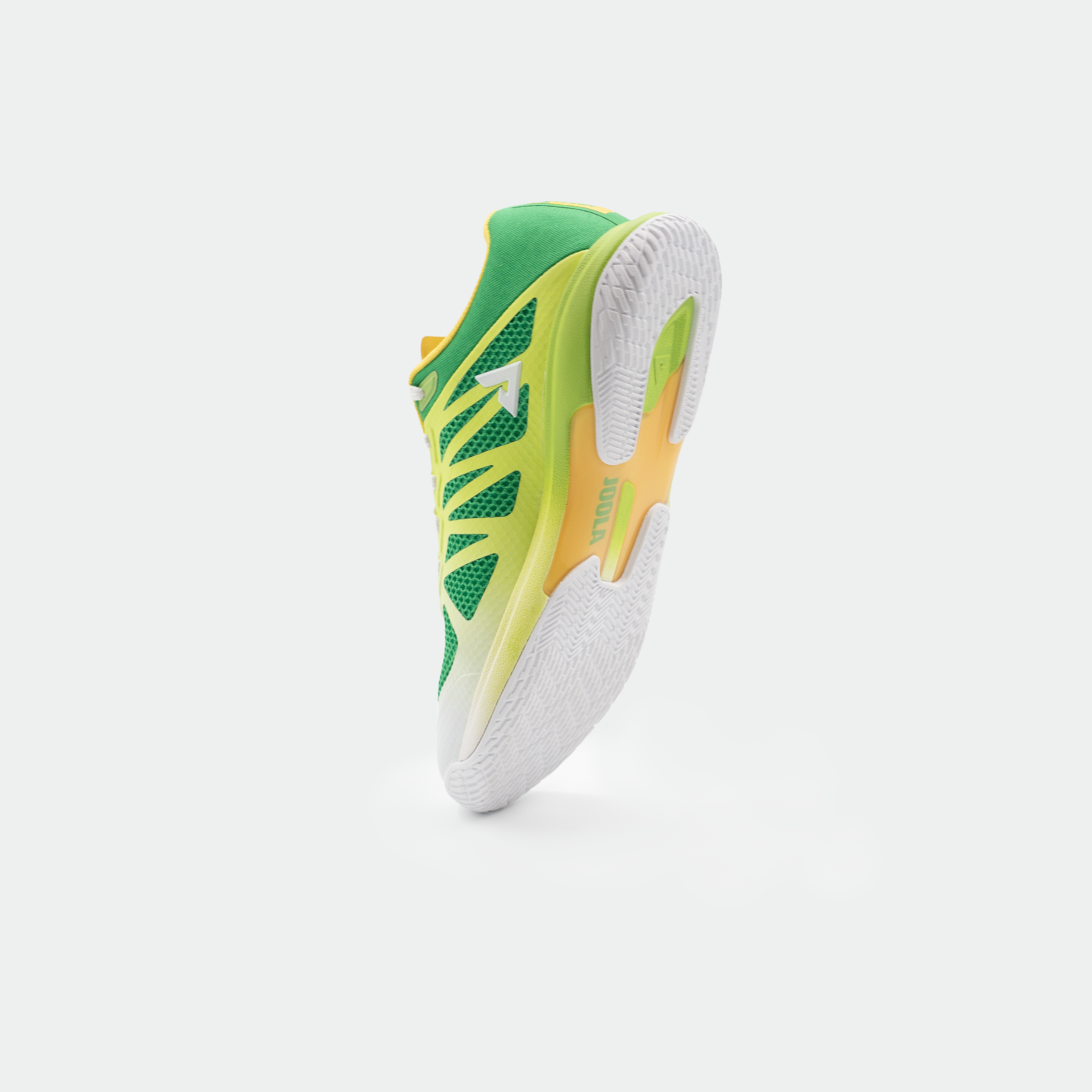 White background, product image of the JOOLA TT SM4SH table tennis, green, yellow and white colorway. Image shows the bottom of the shoe.