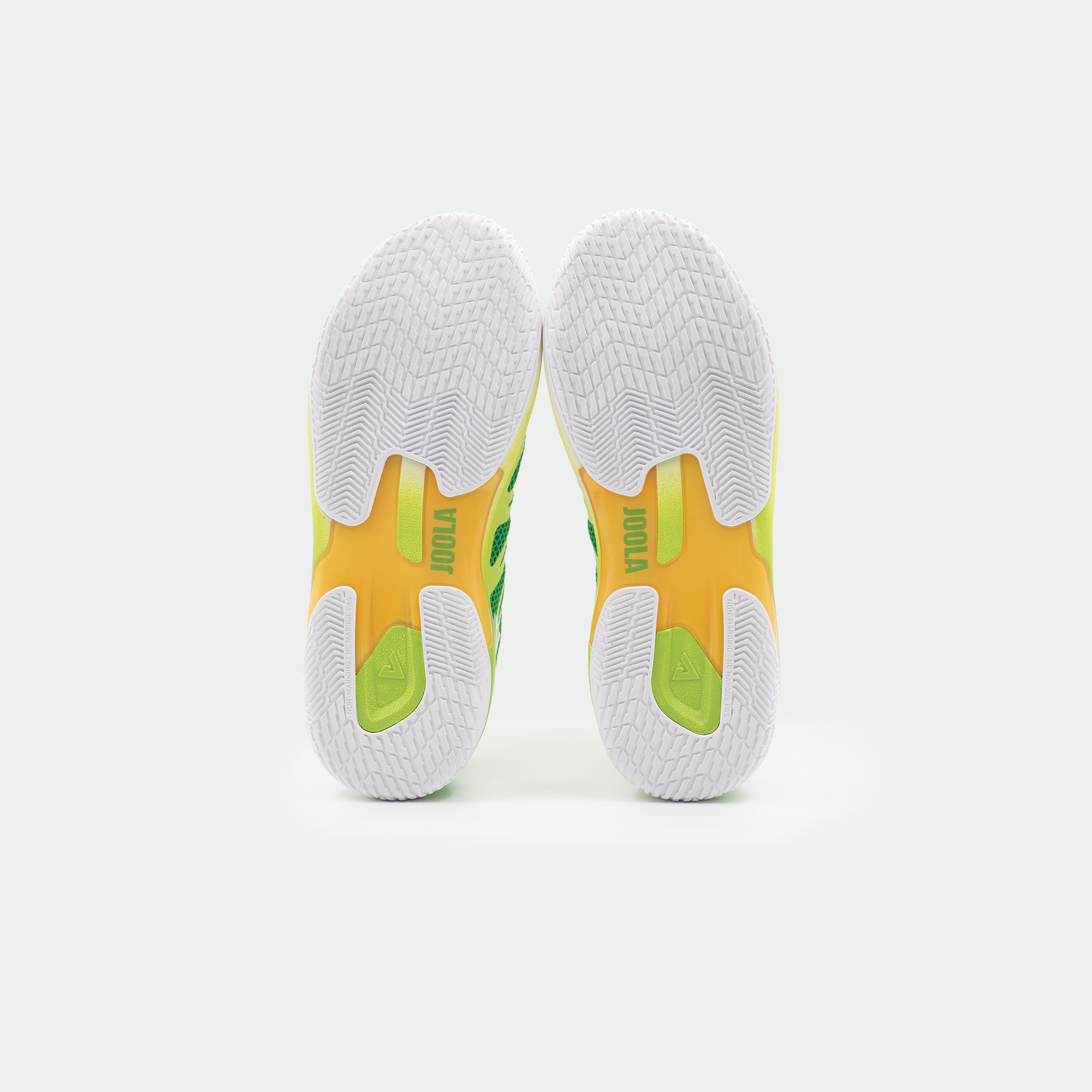 White background, product image showing the bottom of a pair of JOOLA TT SM4SH pickleball shoes, with yellow and green carbon shank.