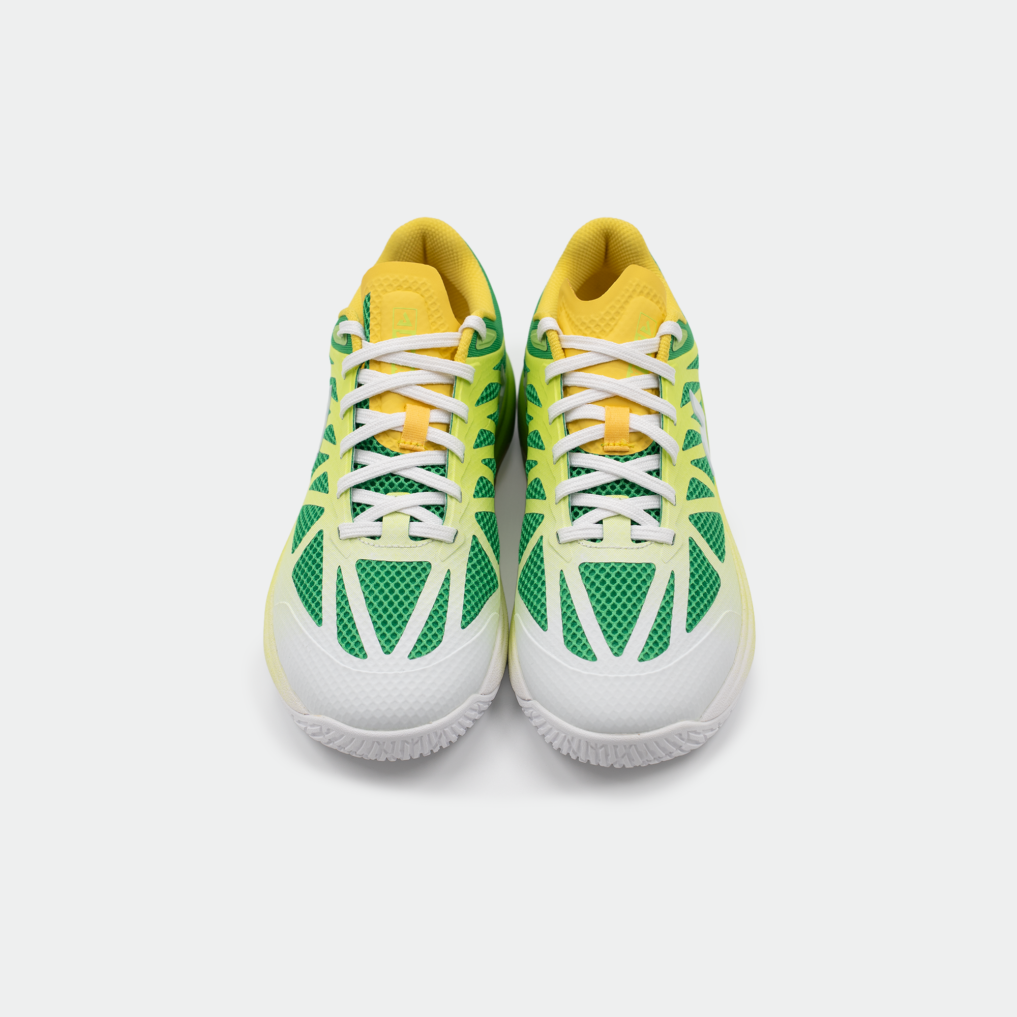 White background, top down view of a pair JOOLA TT SM4SH Table Tennis shoes.