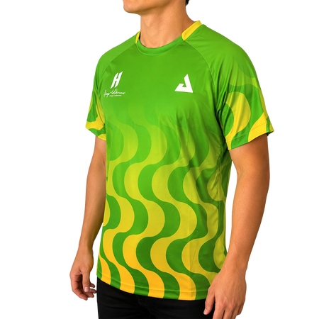 White background, product image showing a male model wearing a Jungle Green Hugo Calderano Copacabana Raglan Short Sleeve.