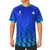 White background, product image showing a male model wearing an Azul  colored Hugo Calderano Copacabana Raglan Short Sleeve.