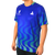 White background, product image showing a male model wearing an Azul  colored Hugo Calderano Copacabana Raglan Short Sleeve.