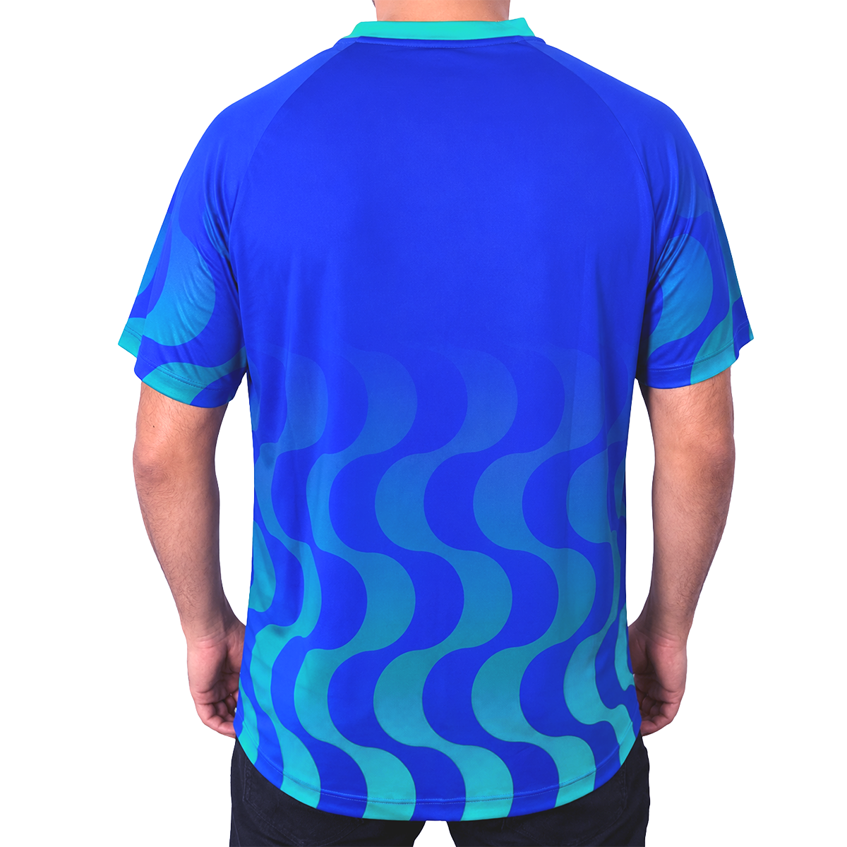 White background, product image showing the rear view of a male model wearing an Azul  colored Hugo Calderano Copacabana Raglan Short Sleeve.