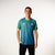 White background, image of Hugo Calderano wearing a Hugo Calderano Gradient Monogram Raglan Short Sleeve shirt.