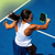 Stylized image of a female pickleball player on a blue court swinging through the ball witht he JOOLA Power FX pickleball paddle.