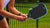Close up on the JOOLA Power FX pickleball paddle in the hand of a female player.