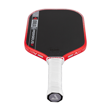 Red and black pickleball paddle with white handle on a white background