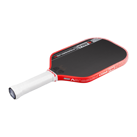Red and white pickleball paddle on a white background