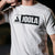 Close up image of a the JOOLA brand logo on the front of a white graphic tee.