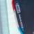 Close-up of a JOOLA Agassi Rally Rocket pickleball paddle with branding and model details.